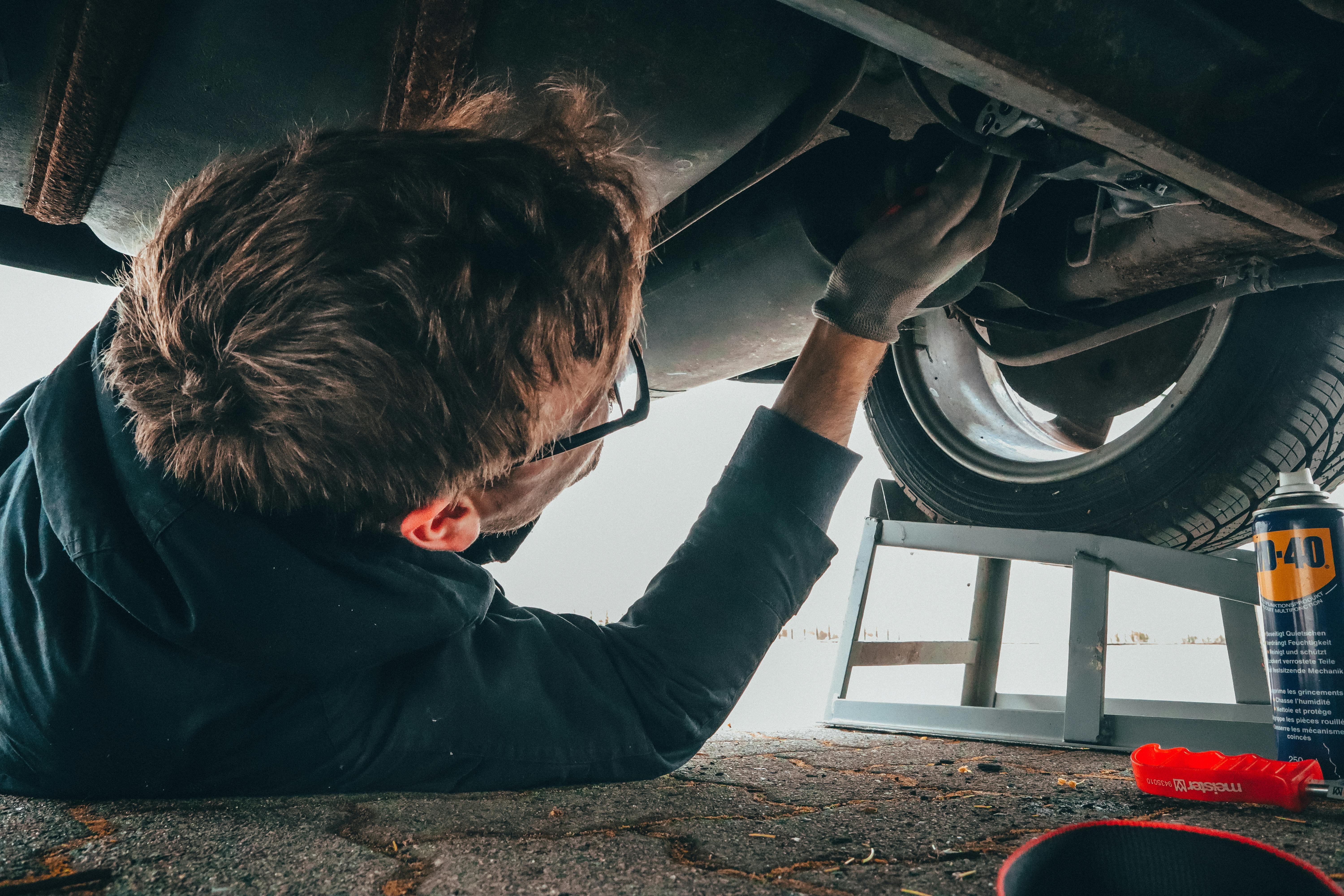 trusted golf cart mechanic working on cart