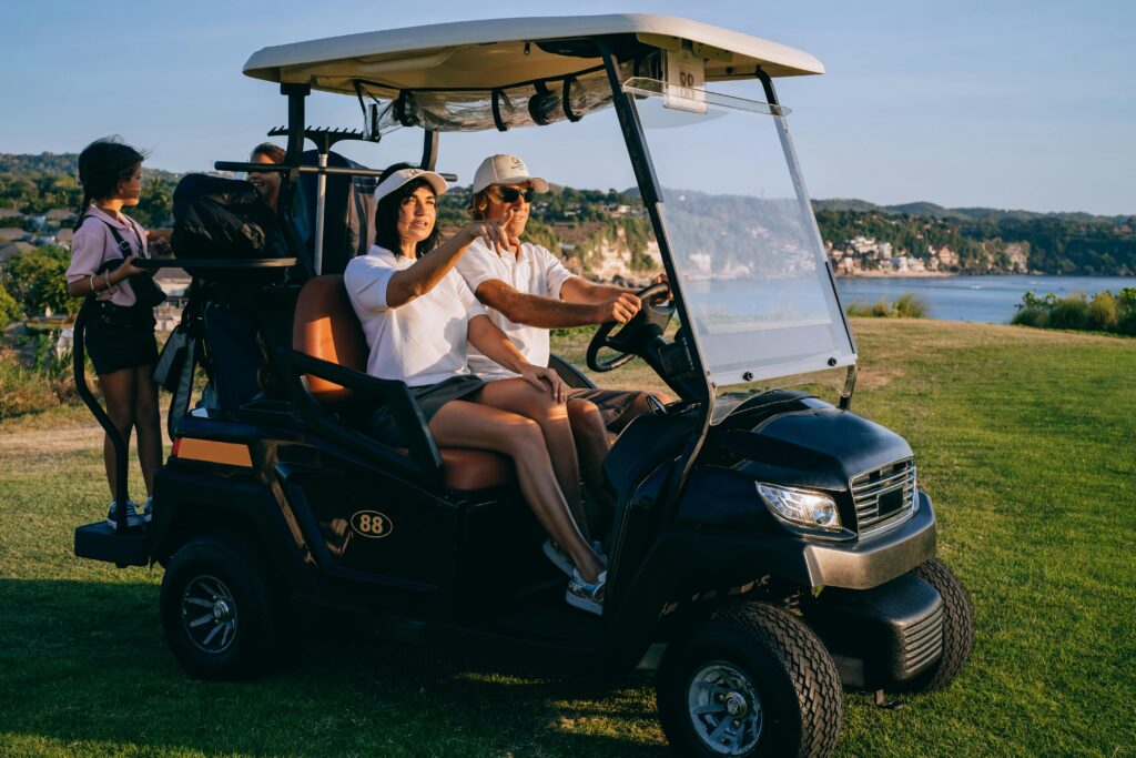 family in golf cart